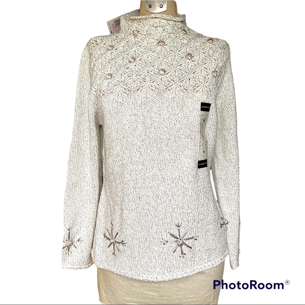 Sweater with silk embroidery size medium. Cream color with taupe embroidery.